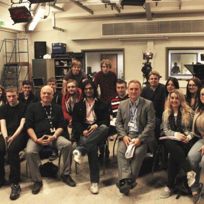 Award winning filmmaker Khurrum M.Sultan with Media lecturer Phil Middleham (L) and Curriculum Area Manager Simon O’Grady (R) and a group of media studies students.