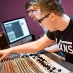 Students using mixing board.