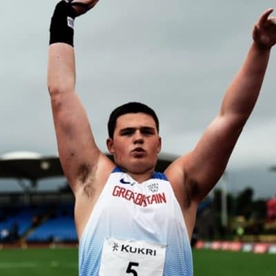Sport student Lewsi Byng holding a shot put