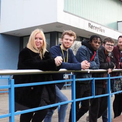 Debbie Isitt with students outside main reception