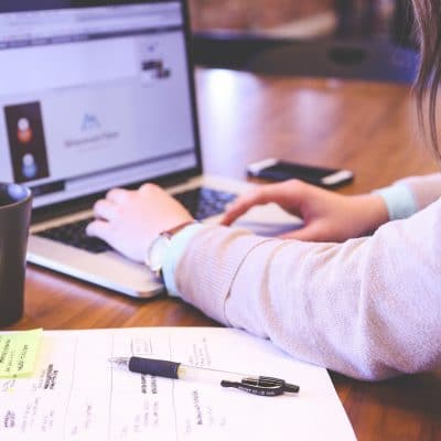 Woman studying at a laptop