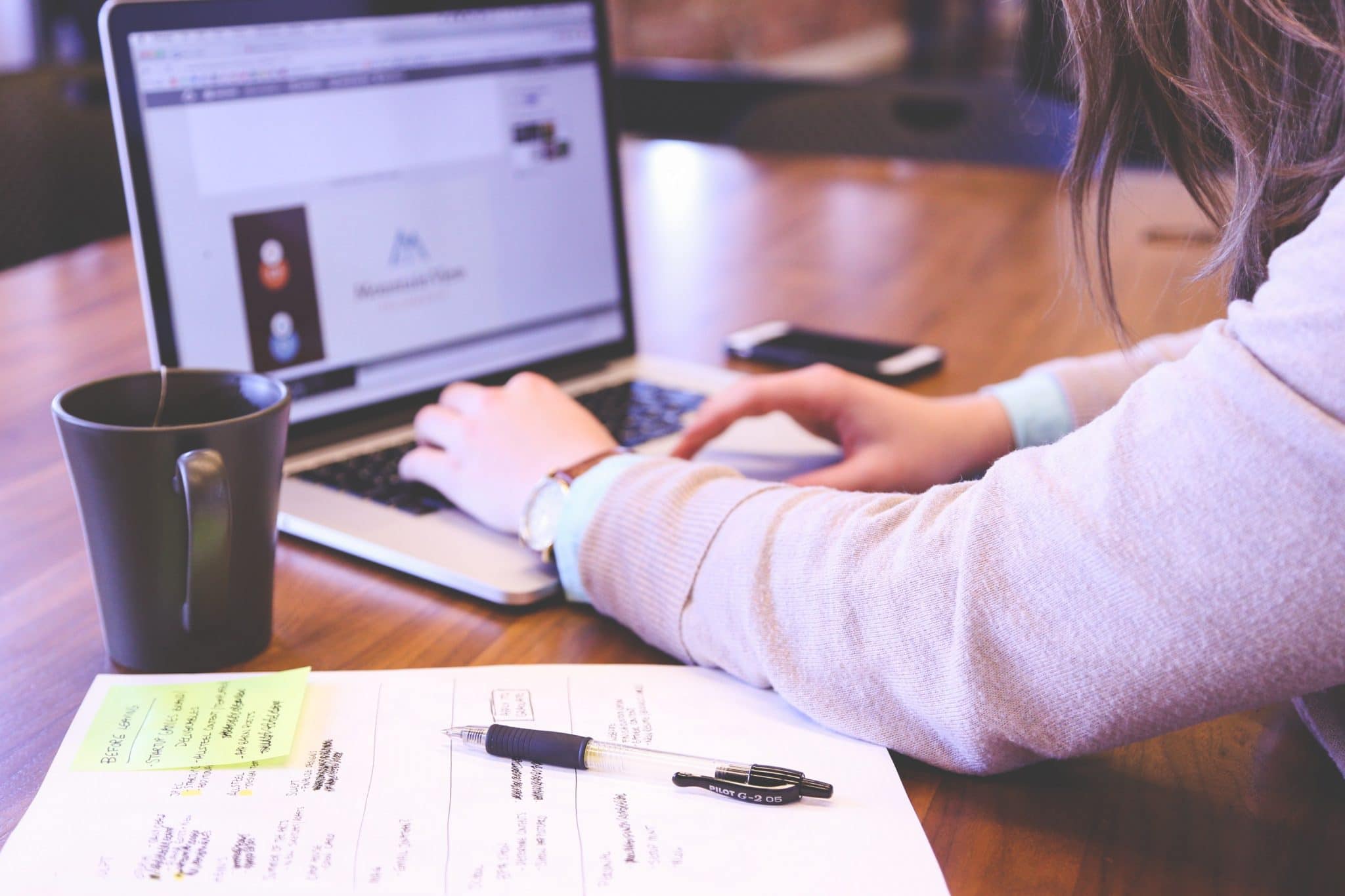 Woman studying at a laptop