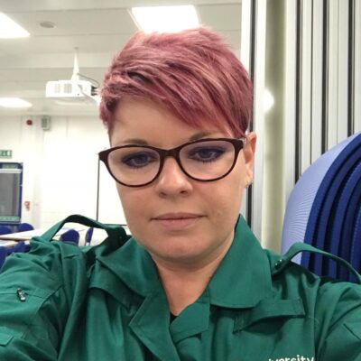 Student paramedic Deborah wearing her paramedic uniform