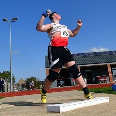 Student Lewis throwing shot put