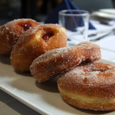 4 doughnuts on a plate made by catering students
