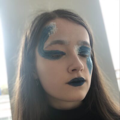 student with waves and scales make up at Stratford-Upon-Avon College