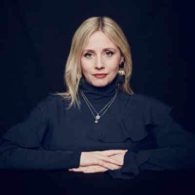 Sinéad Matthews looking at camera with hands crossed