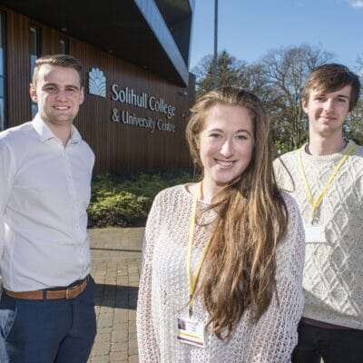 3 students standing