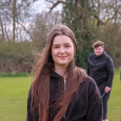 Student looking at camera at Stratford-Upon-Avon College