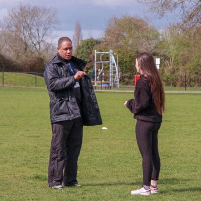 teacher talking to student