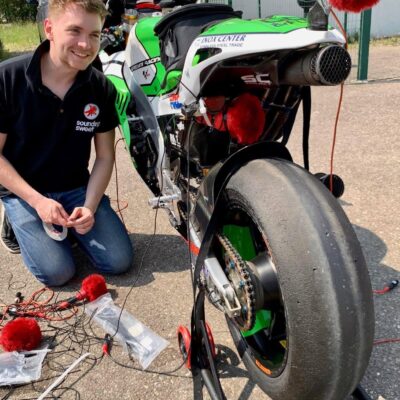 Jack next to motorbike