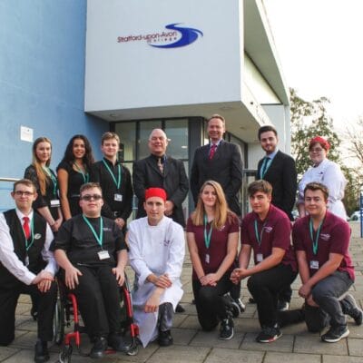John and students outside Stratford College at stratford-upon-avon college