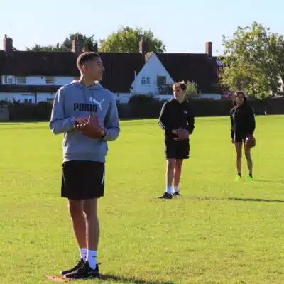 Students with Softball gloves at stratford-upon-avon college
