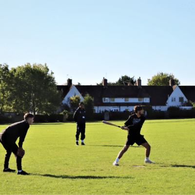 Student swinging Softball bat at stratford-upon-avon college