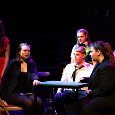 The cast of Macbeth at feast by performing arts students at Stratford-upon-avon College