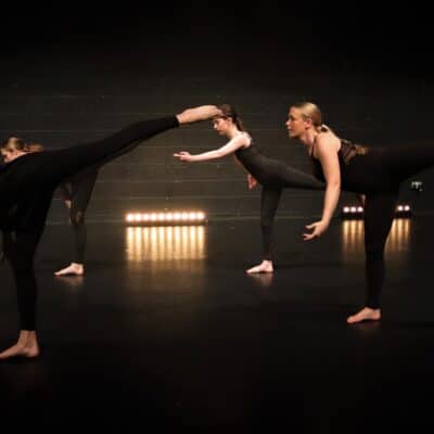 Dancing leg balance by performing arts students at Stratford-upon-avon College