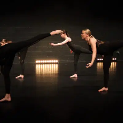 Dancing leg balance by performing arts students at Stratford-upon-avon College
