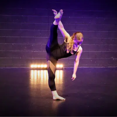 Dancing split stretch by performing arts students at Stratford-upon-avon College