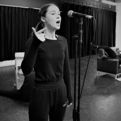 Student at microphone