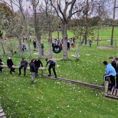 Students doing outdoor assault course