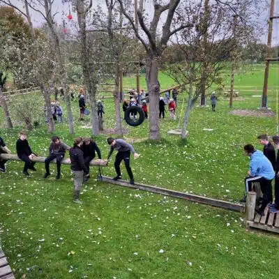 Students doing outdoor assault course