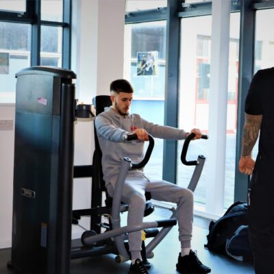 Sport student on push machine