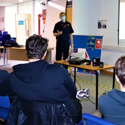 Peter speaking to students
