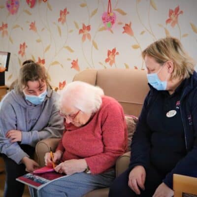 Chloe with residents