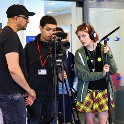 sami giving instructions for camera use