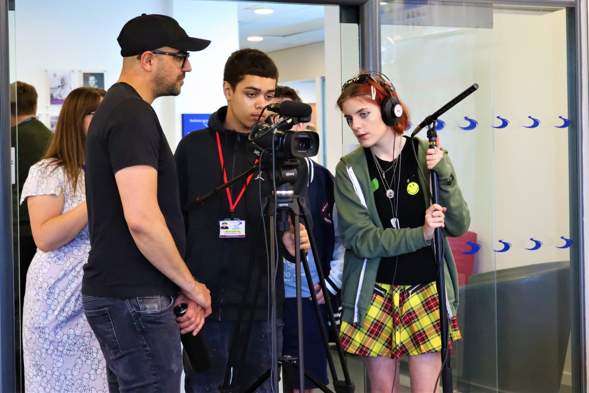 sami giving instructions for camera use