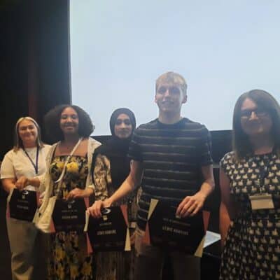 Lewis with teachers