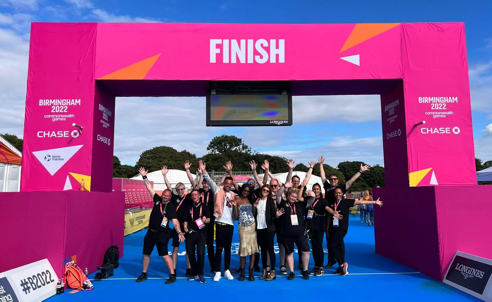 Lewis Hawkins with his team