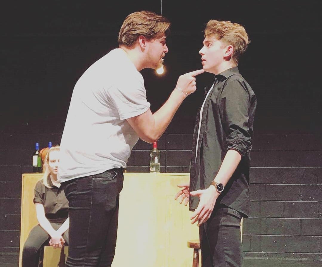 Simon in a performance of Glory Dazed at College