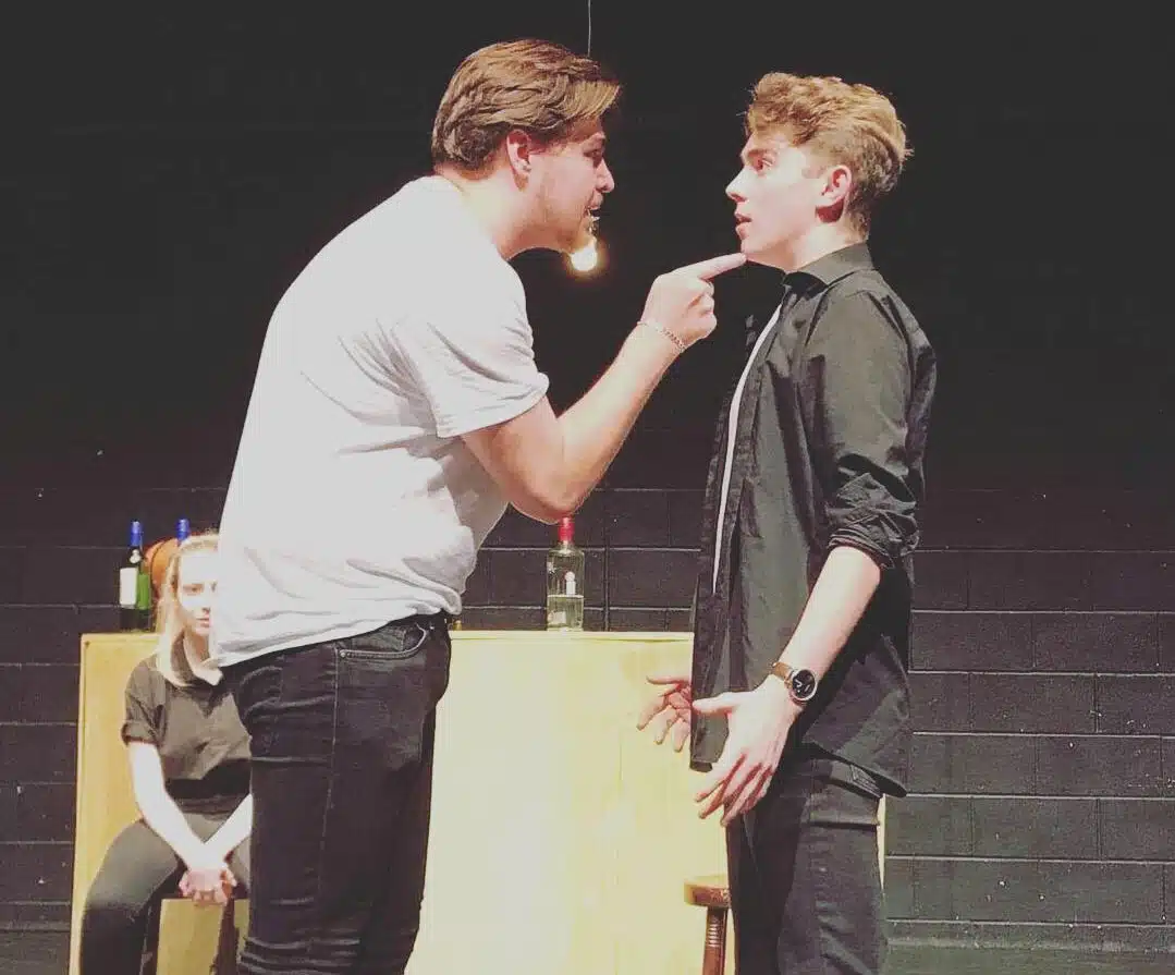 Simon in a performance of Glory Dazed at College