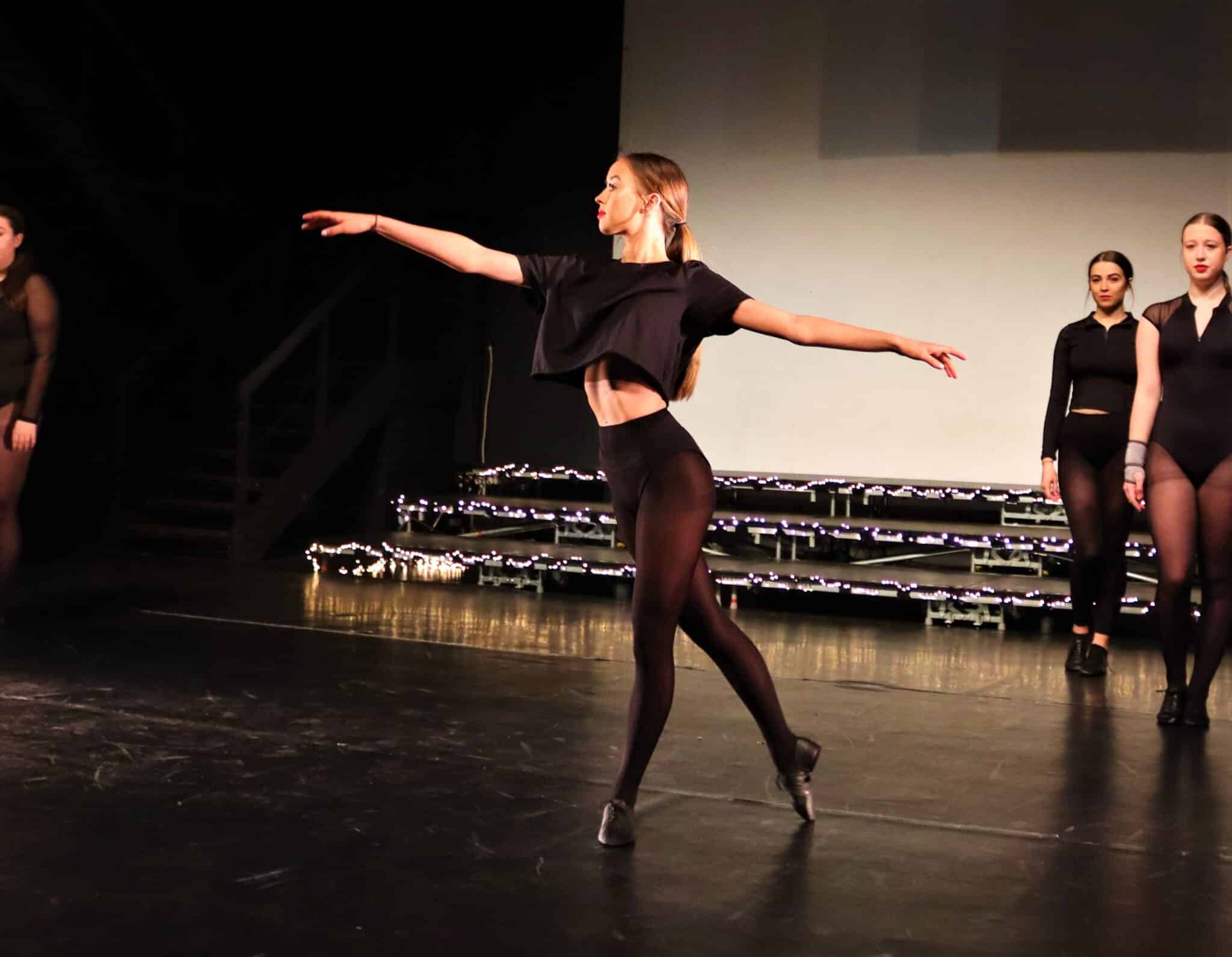 Dance student rehearses a routine.