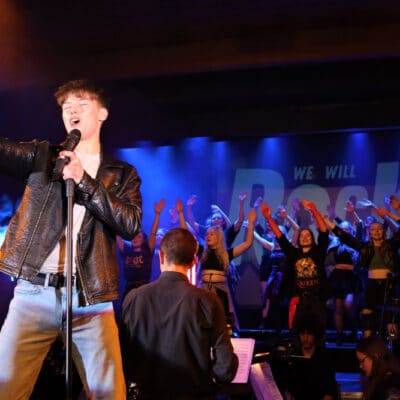 Billy performing We are the Champions