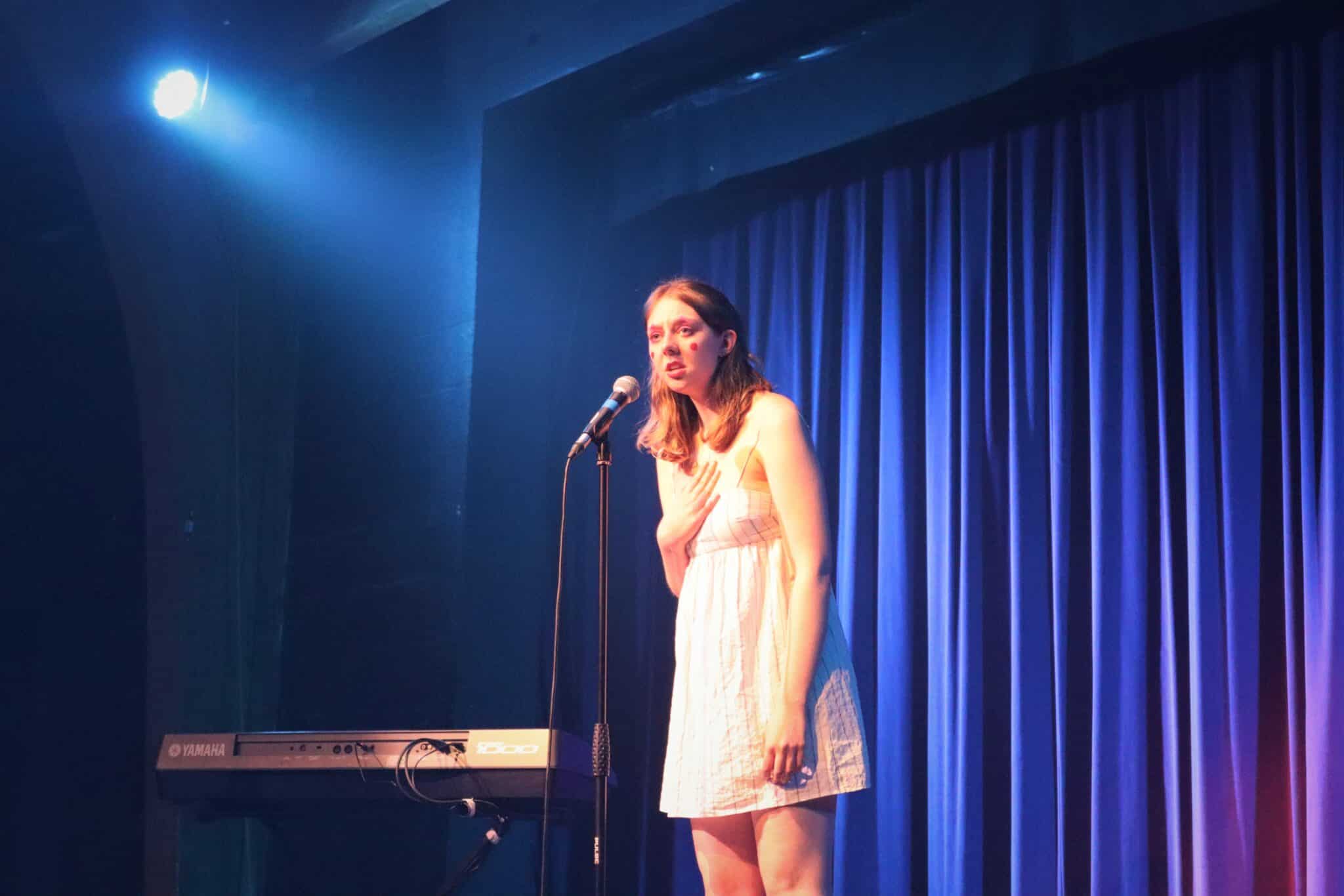 Student on mic in cabaret