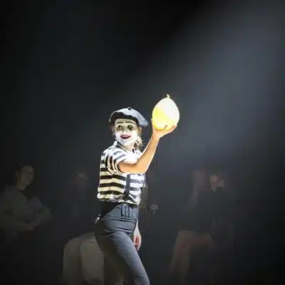 Student in mime act