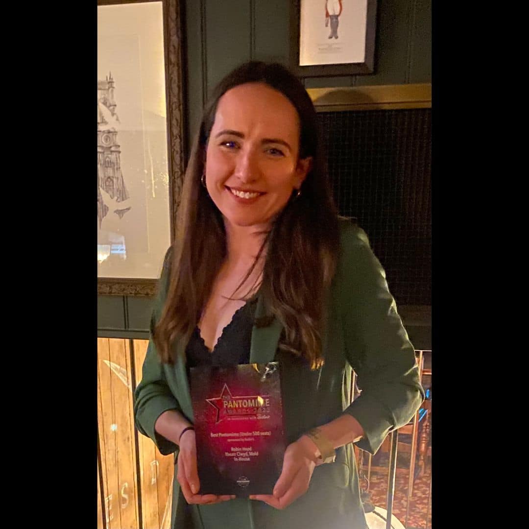 Alice with award