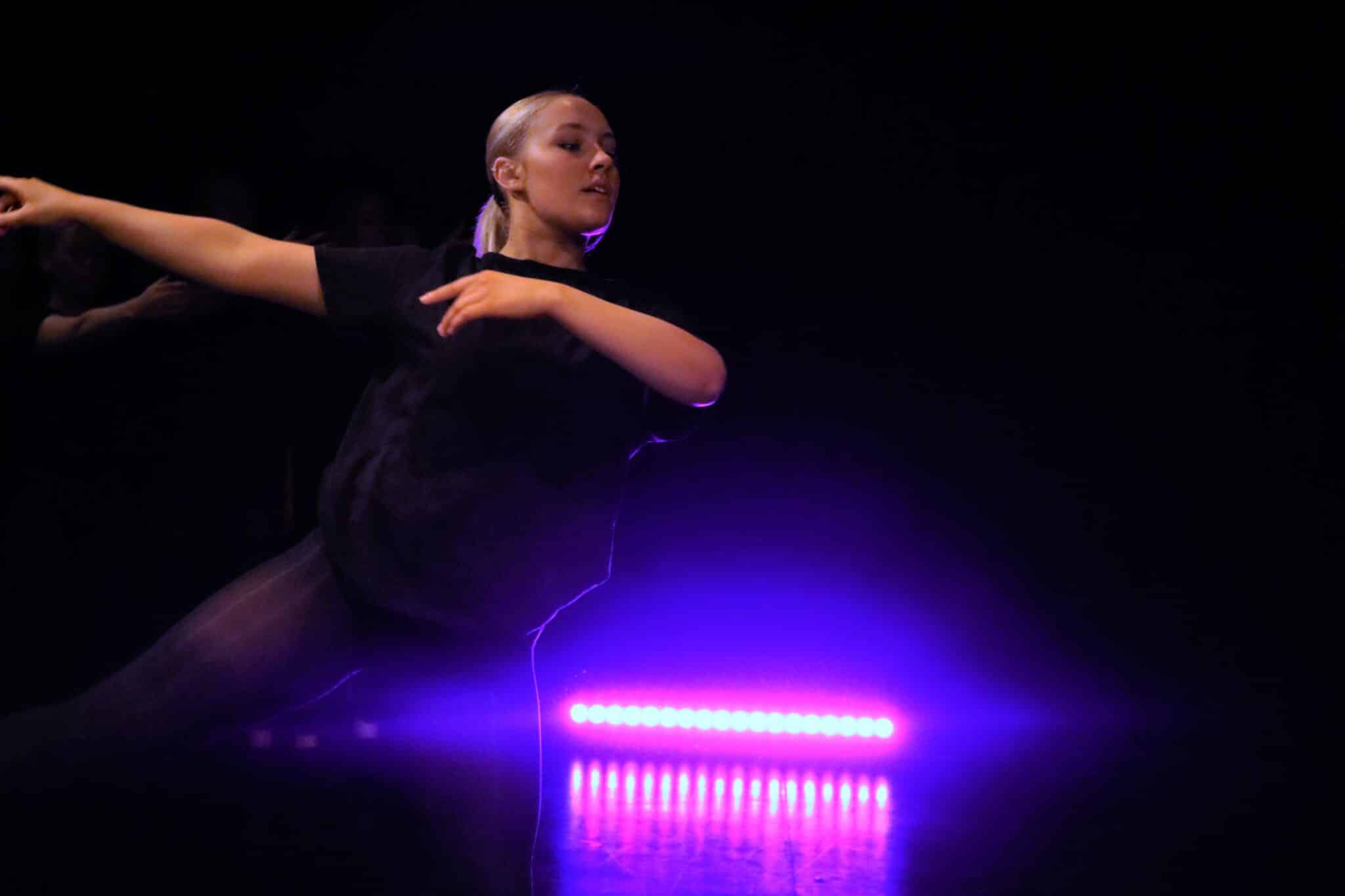 student in dance show