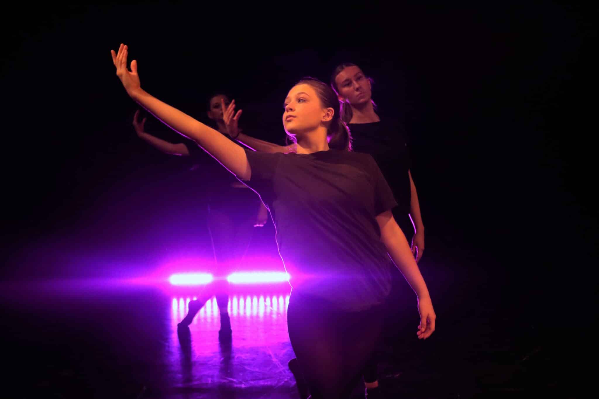 student in dance show