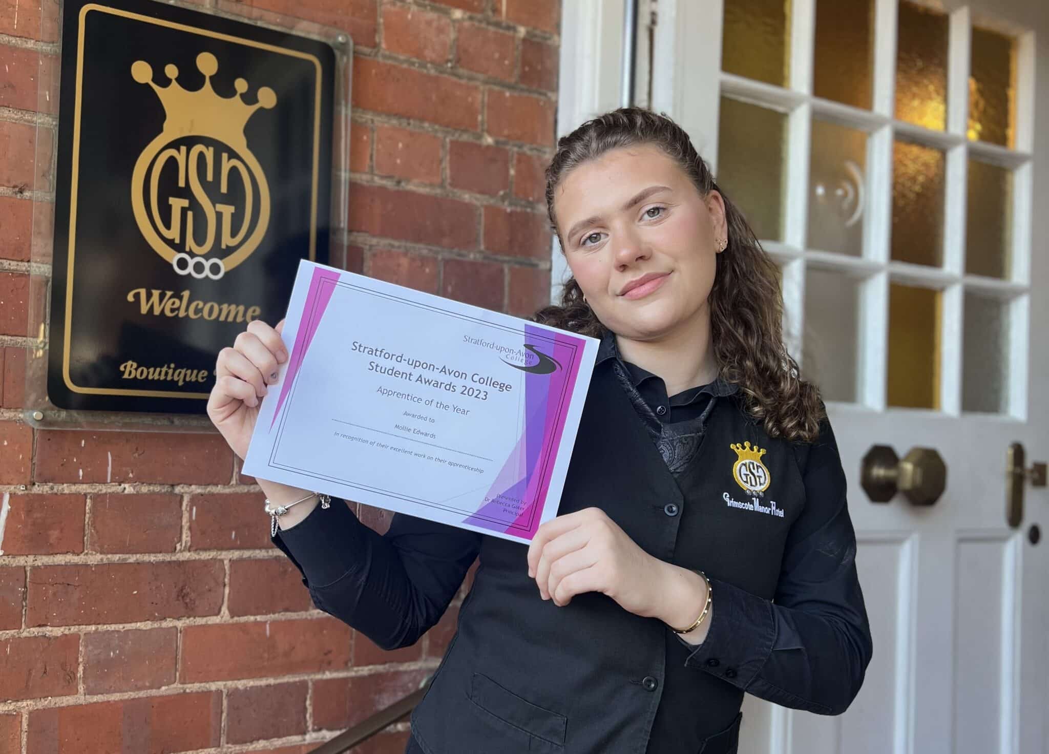 Mollie Edwards with certificate