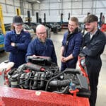 students in motor vehicle workshop