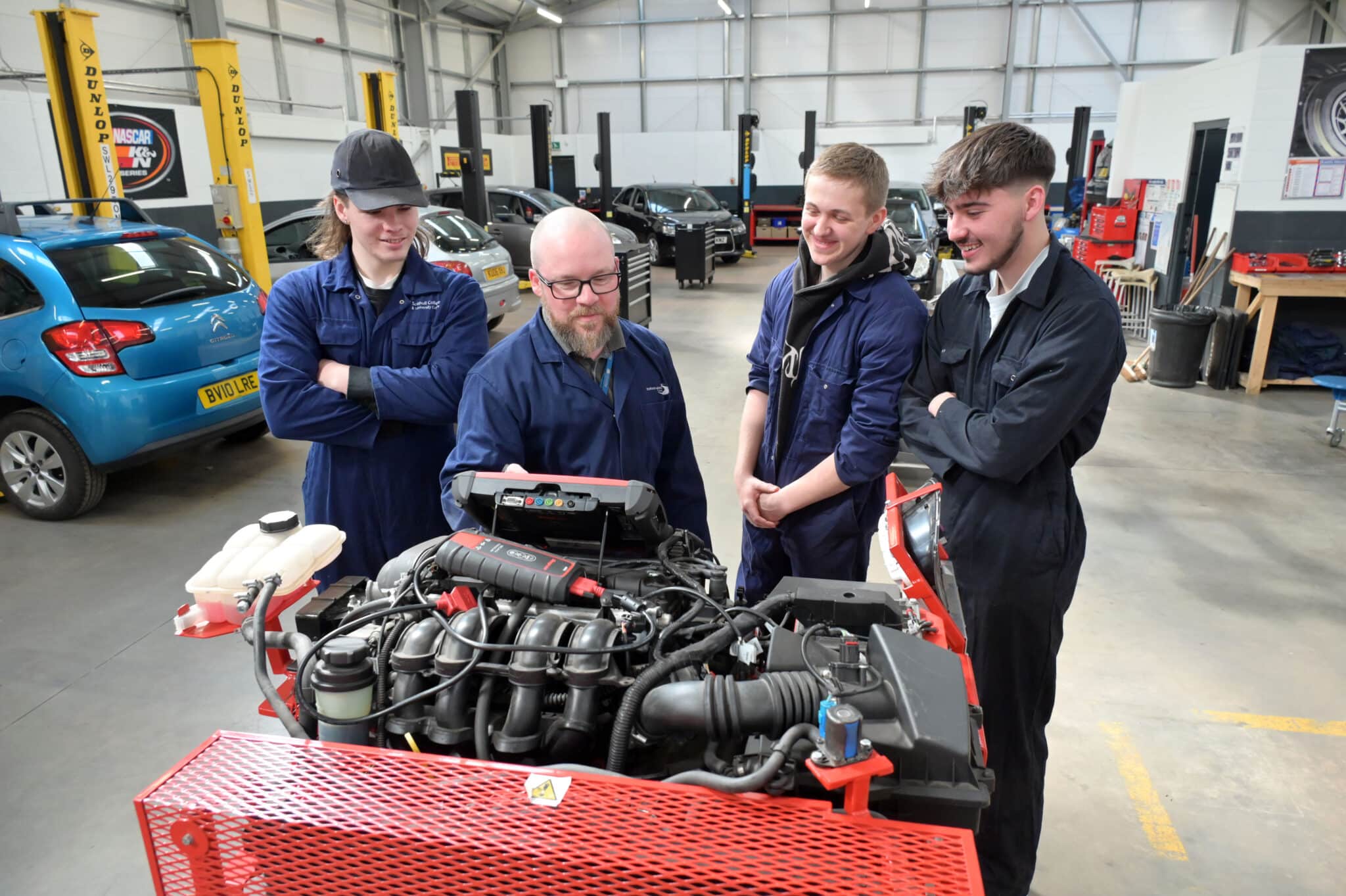 students in motor vehicle workshop