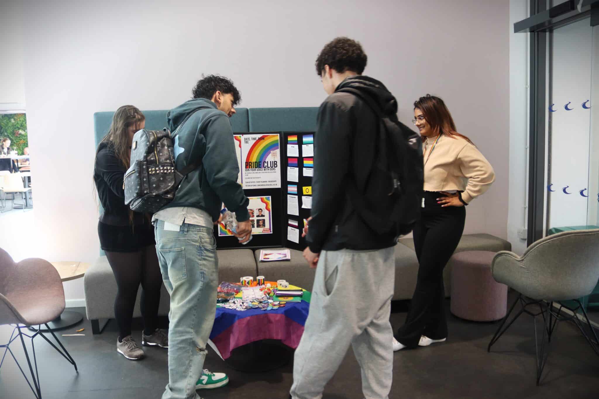 College celebrates Pride Month - students interacting with each other