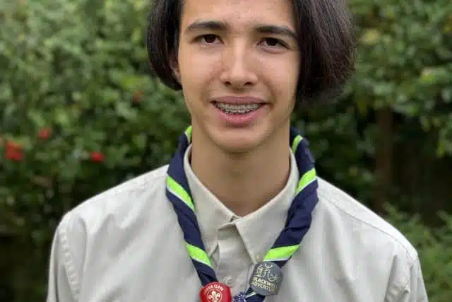 Stratford colleges student nathan in scout uniform
