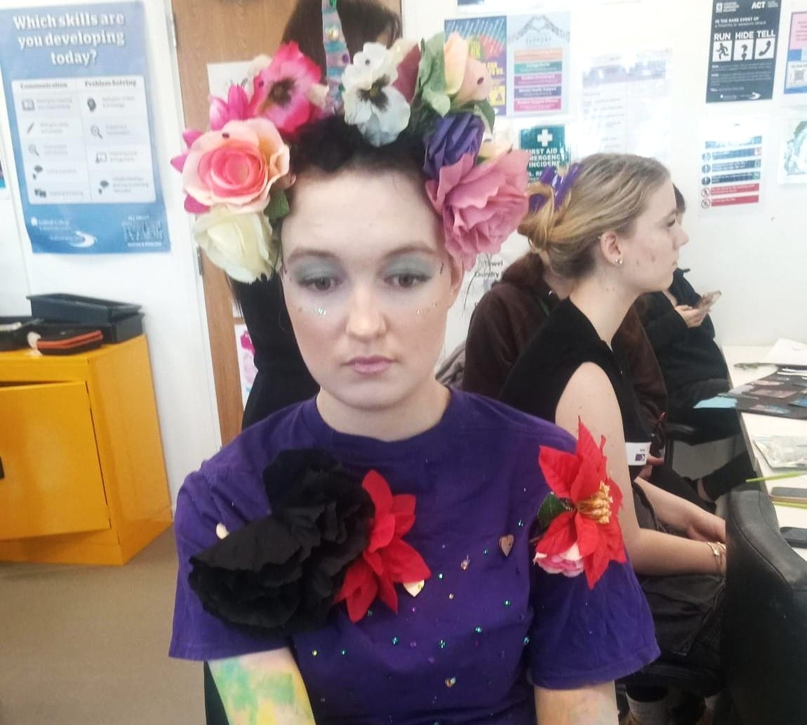 Girl in flowery blue make-up
