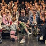 simon pegg sitting in the audience of students
