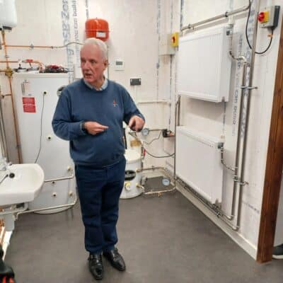 gentleman talking about the new heat pump facility