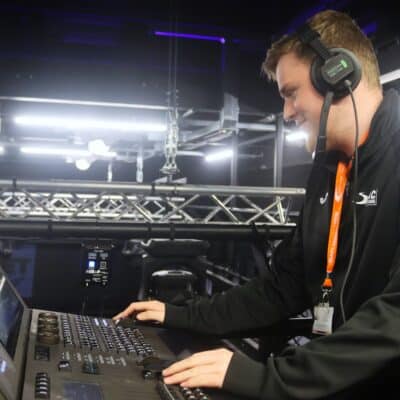 student at a tech desk